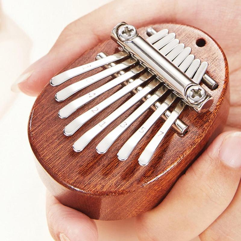 Cute Shaped Mini 8-tone Thumb Piano, 1 Count Musical Instrument for Children & Adults