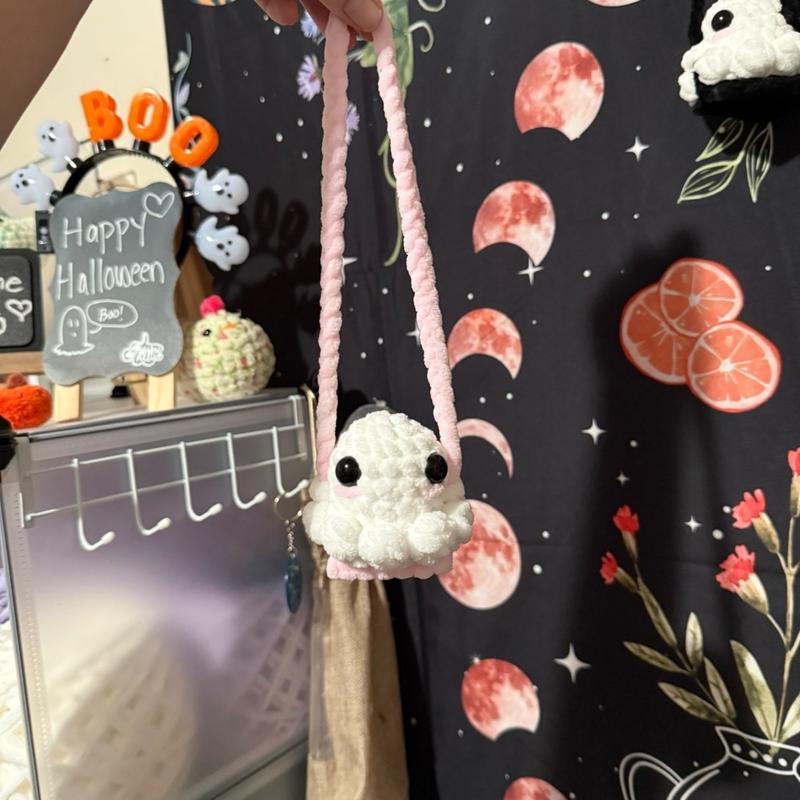 Crocheted Ghost on a swing