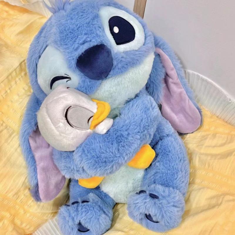 In the Stippy series, cute stuffed animals for boys and girls are gifts for children hugging Duck and Donald Duck