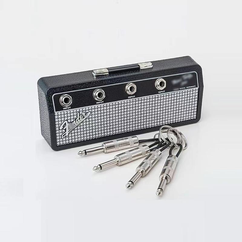 Guitar amp key holder, includes 4 guitar plug keychains and 1 wall mounting kit. Quick and easy installation.