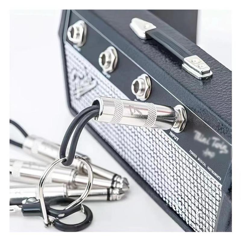 Guitar amp key holder, includes 4 guitar plug keychains and 1 wall mounting kit. Quick and easy installation.