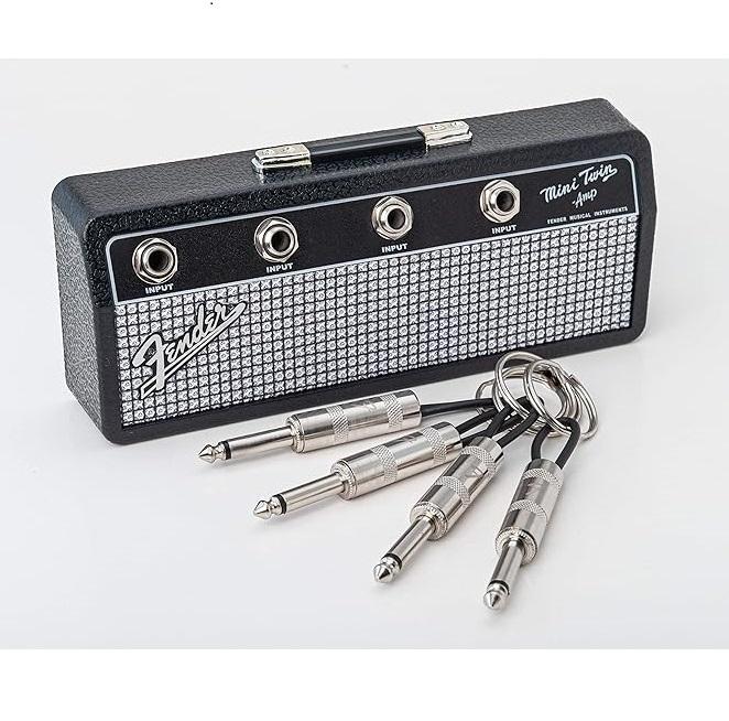 Guitar amp key holder, includes 4 guitar plug keychains and 1 wall mounting kit. Quick and easy installation.