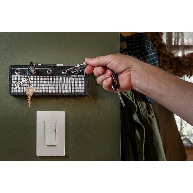 Licensed Fender Jack Rack- guitar amp key holder, includes 4 guitar plug keychains and 1 wall mounting kit. Quick and easy installation.